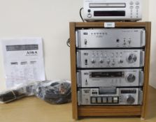 An Aiwa 22 High End Micro System - contained within purpose built cabinet - all units working