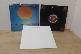 A lot of three albums by Santana - Latin Rock / Fusion / Psychedelic interest