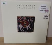 A 2015 reissue clear vinyl of Paul Simon's Graceland - sealed / new - a nice collectable edition