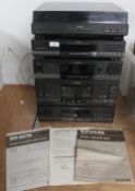 A Toshiba Stacking system with turntable , compact disc player and cassette deck