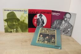 A jazz interest lot with eight albums by Coleman Hawkins on offer here