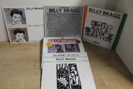 A lot of five records by Billy Bragg - as per the photos - light sleeve but overall VG+ copies -