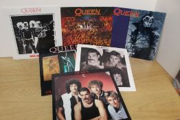 A lot of twelve Queen singles ( 8 x 12' and 4 x 7' ) as in the photos - condition is excellent -