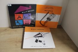 A lot of three albums by Billy Bragg - as per the photos - light sleeve but overall VG+ copies
