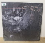 An original 4AD ' Treasure ' by the Cocteau Twins in shrink