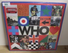 A sealed mint copy of the Who's 2019 set - which includes a 12 inch blue vinyl , a 12 inch white