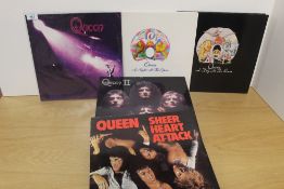 A lot of five Queen albums as in the photos - condition is excellent - some of the best we have
