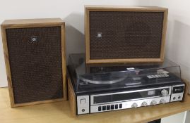A Vintage Sanyo Music System with Speakers - a nice retro look to this item