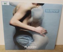 A 2016 press of Placebo's ' sleeping with ghosts ' sealed blue vinyl wallet gatefold edition vinyl