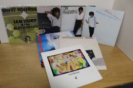 A 12 album lot - Ian Dury - Fleetwood Mac - Abba and more - some nice titles in here -shop /