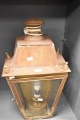 A large copper lantern, of tapering square section form with raised surmount, most likely had a