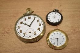 A Swiss Made 8-day pocket watch, w6.5cm, sold together with a Quartz clock face and a miniature