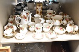 A Royal Albert Old Country Rose pattern part dinner service, decorated with gilt edges and floral