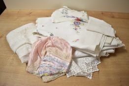 A small selection of vintage and antique soft goods, to include a satin sleeping cap/bonnet, child's