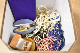 An assortment of costume jewellery, including faux pearls, beaded necklaces and statement pieces