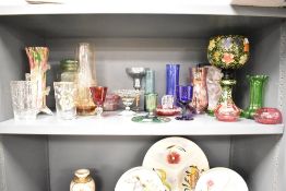 A selection various coloured glass wares, to include Bristol blue, cranberry, green glass