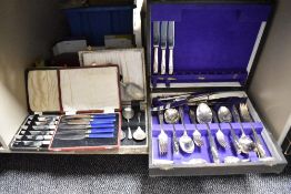 A canteen having purple interior containing Moss Rose silver plated cutlery, sold together with