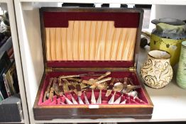 A oak canteen having red felt interior containing stainless steel cutlery, (55)