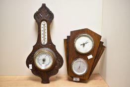 An early 20th century Aneriod barometer with carved oak case and thermometer scale 47cm sold