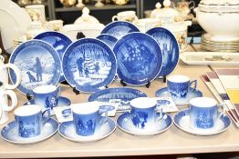 A group of blue and white Royal Copenhagen porcelain 'Christmas Day' plates and saucers, decorated