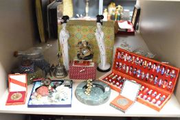 A collection of Chinese figures, to include a pair of ceramic madams, a Wah Jiang figurine,