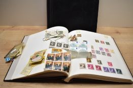 Two folders containing a quantity of various stamps, to include Argentina, Canada, Republique Du