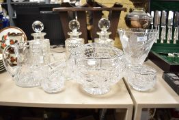 A 20th century Briard clear cut crystal glass vase, having footed conical body cut with floral