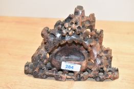 A carved Chinese soapstone carving of a grapevine, h14cm