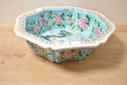 A decorative 20th century Chinese famille rose wash bowl with mark to underside, 32cm x 32cm x