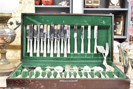 A mahogany canteen with green felt interior containing silver plated cutlery, impressed Sheffield