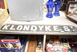 A late 19th / early 20th century cast iron street sign for 'Klondyke St.', L101cm