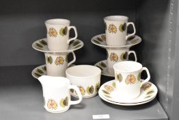 A J&G Meakin Studio part coffee set, comprising five cups, six saucers, sugar and cream, all