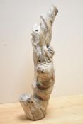 An unusual anthropomorphic wooden sculpture in the form of a tree branch, heavily burnished,