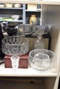 A selection of cut glass items comprising decanter, mantel clock and bowls of various sizes etc.