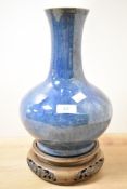 An attractive Chinese mottled blue/Jun glazed vase, having a flared cylindrical neck over the