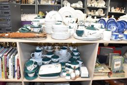 A Denby Greenwheat pattern dinner service decorated with floral designs on a white ground, to