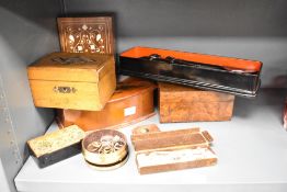 A small group of costume jewellery, primitive hat pins and a miniature compass, sold together with