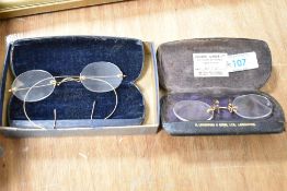 Two pairs of spectacles both in branded cases from S.Leighton & Sons Ltd Lancaster and the other