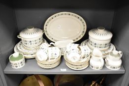 A Royal Doulton Tapestry pattern tea service, decorated with fruit and foliage on an ice white