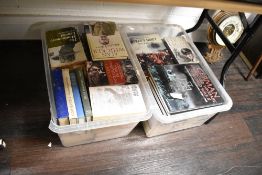 Two boxes containing various military warfare books, to include Intelligence in War by John