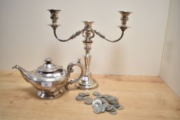 An Estacy silver plated teapot, of traditional form, a Viners silver plated three-branch