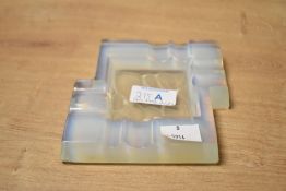 A Andre Hunebelle opalescent glass ash tray, signed to base, w12.5 x d12cm
