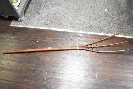A late 19th / early 20th century wooden pitchfork, h153cm