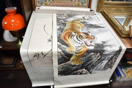 A Chinese scroll depicting a tiger by a waterfall, signed upper right, L123cm, sold together with