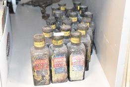 A group of 17 early 20th century glass Sandringham varnish stain bottles, retailed by Martindale