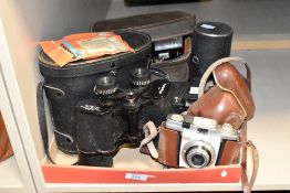 A vintage Kodak 'Colownap 35' camera, sold together with a pair of Boots Pacer binoculars, a