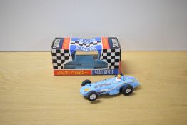 A Tri-ang Scalextric Race Tuned Car, C77 Offenhauser Front Engine in light blue with racing number 4