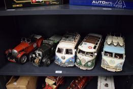 Five modern reproduction tin plate Vehicles, VW Campervans x3 having various decoration, No 8 Racing