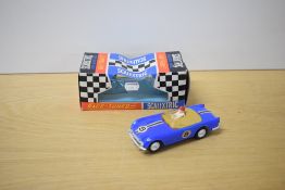 A Tri-ang Scalextric Race Tuned Car, C84 Triumph TR 4A Sports in blue with racing number 8, driver