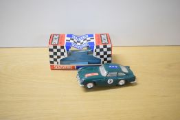 A Tri-ang Scalextric Race Tuned Car, C68 Aston Martin DB4 GT in green with racing number 3 and stars